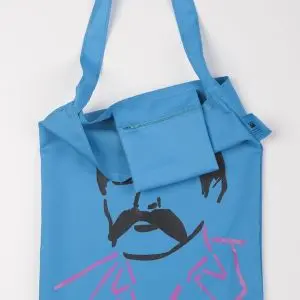 Niebieski materiał bawełniany z czarnym suwakiem, detal zamka